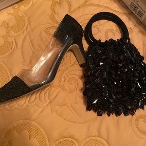 Black 3” sequin heels with a clear middle paired with this beautifully handbag.